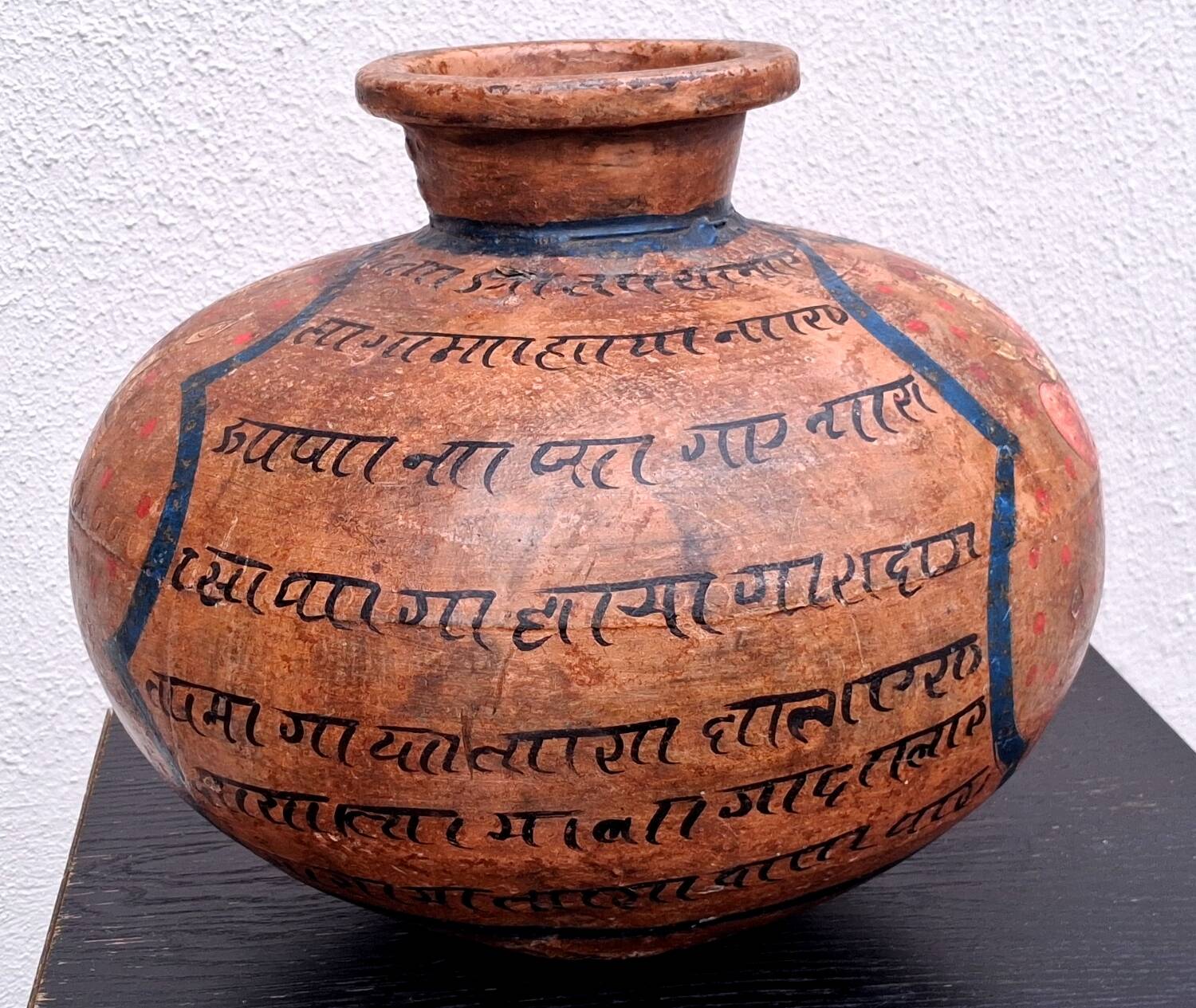 Terracotta vase, decoration of Persian figures.