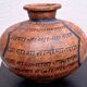 Terracotta vase, decoration of Persian figures.
