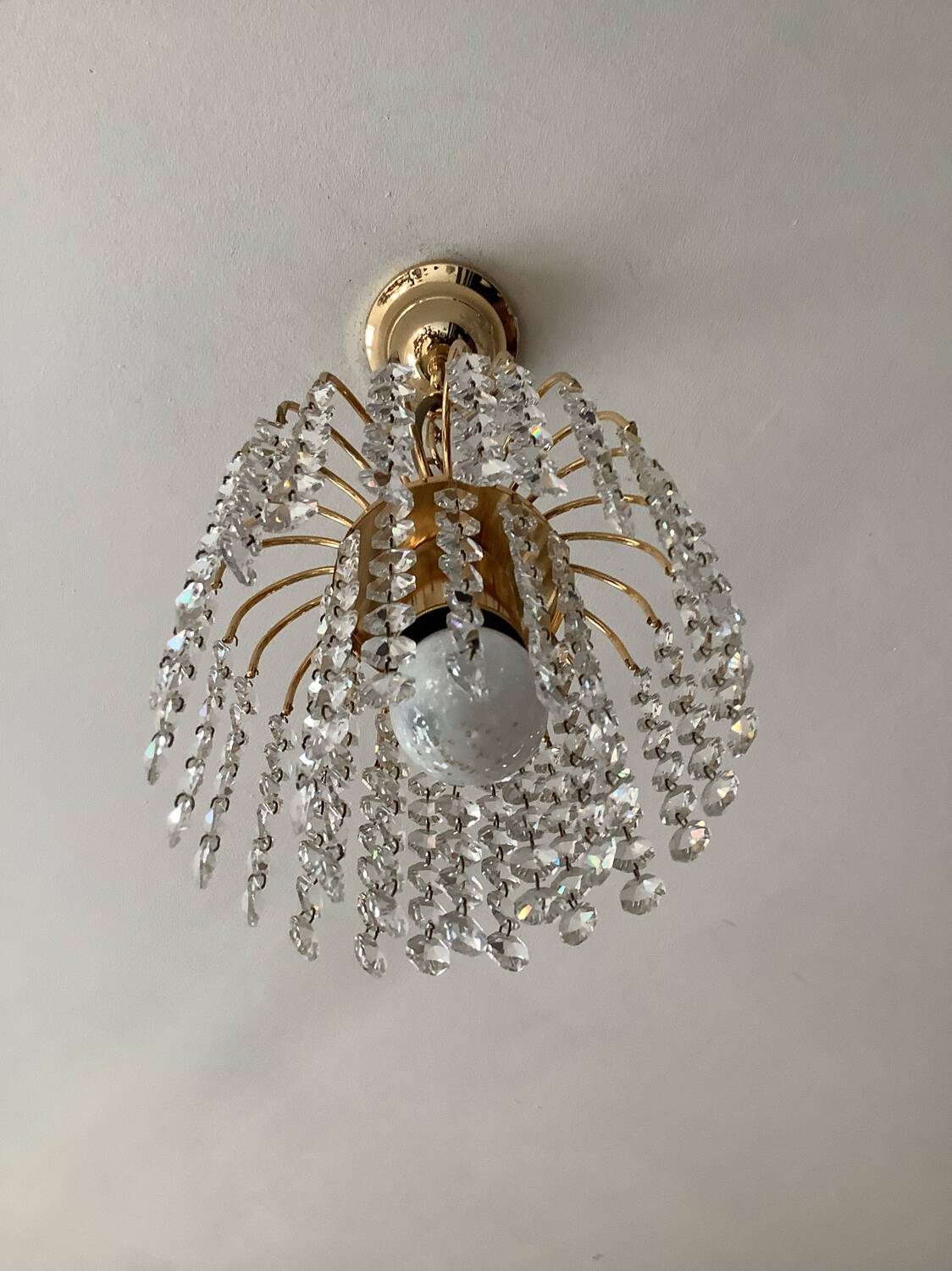 Small vintage brass chandelier with crystal droplets