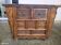 Small exotic Asian buffet with two deep drawers for storage.