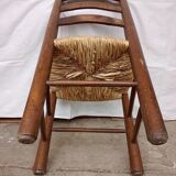 Brutalist chairs in walnut and straw