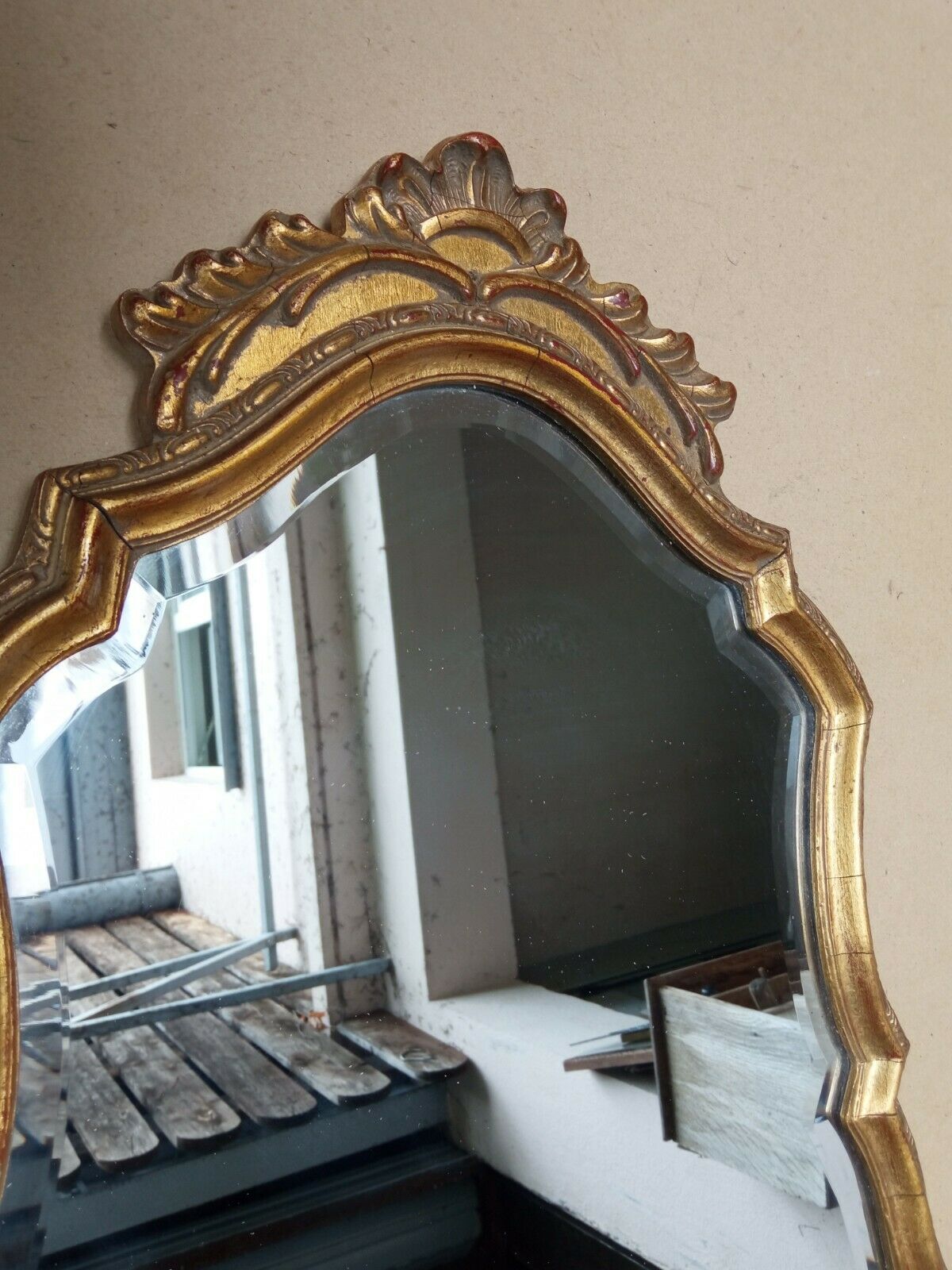 Golden wall mirror with gold leaf Deknudt - beveled ice - Louis XV style