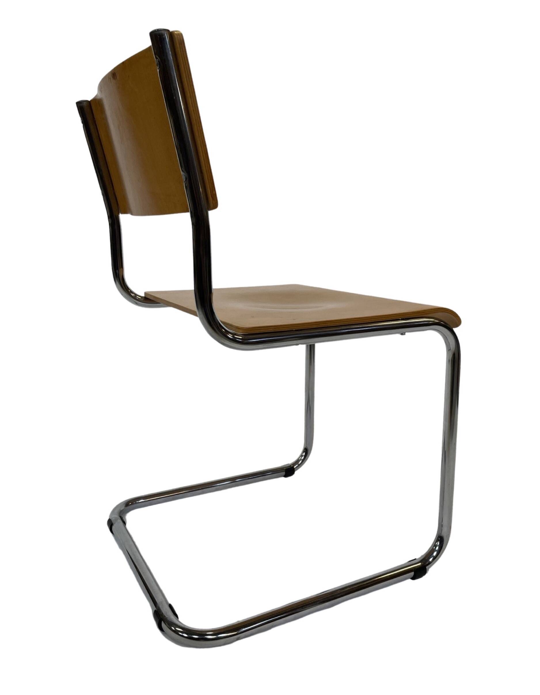 Set of four vintage dining room chairs, wood and chrome,  1970s