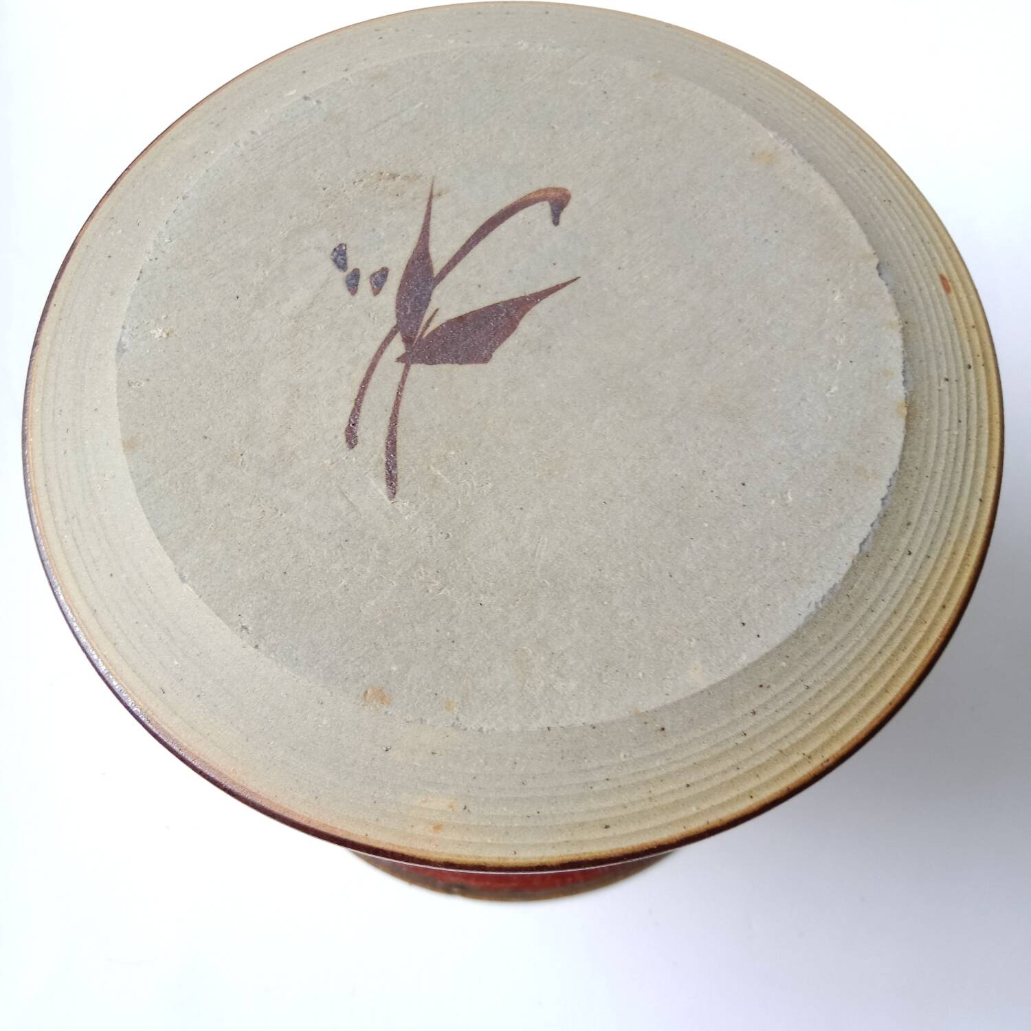 Red and blue glazed stoneware vase signed 12 cm