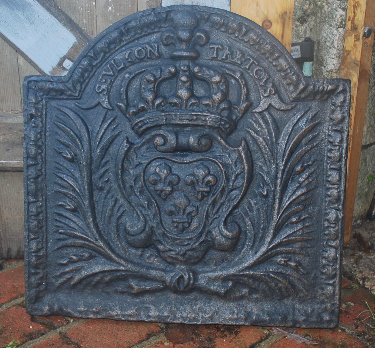 Old cast iron fireplace plate