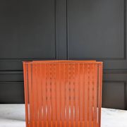 Vintage metal magazine rack in perforated orange/Mathieu Mategot style/70s