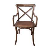 Curved wooden armchair