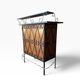 Vintage wooden bar counter with ceramic accents.
