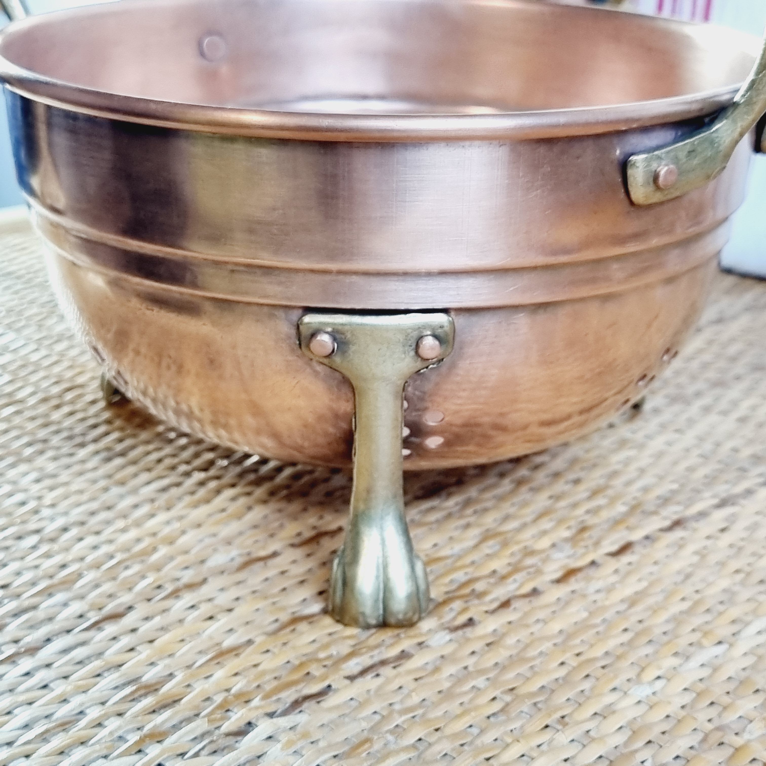 Copper and brass strainer lion's leg