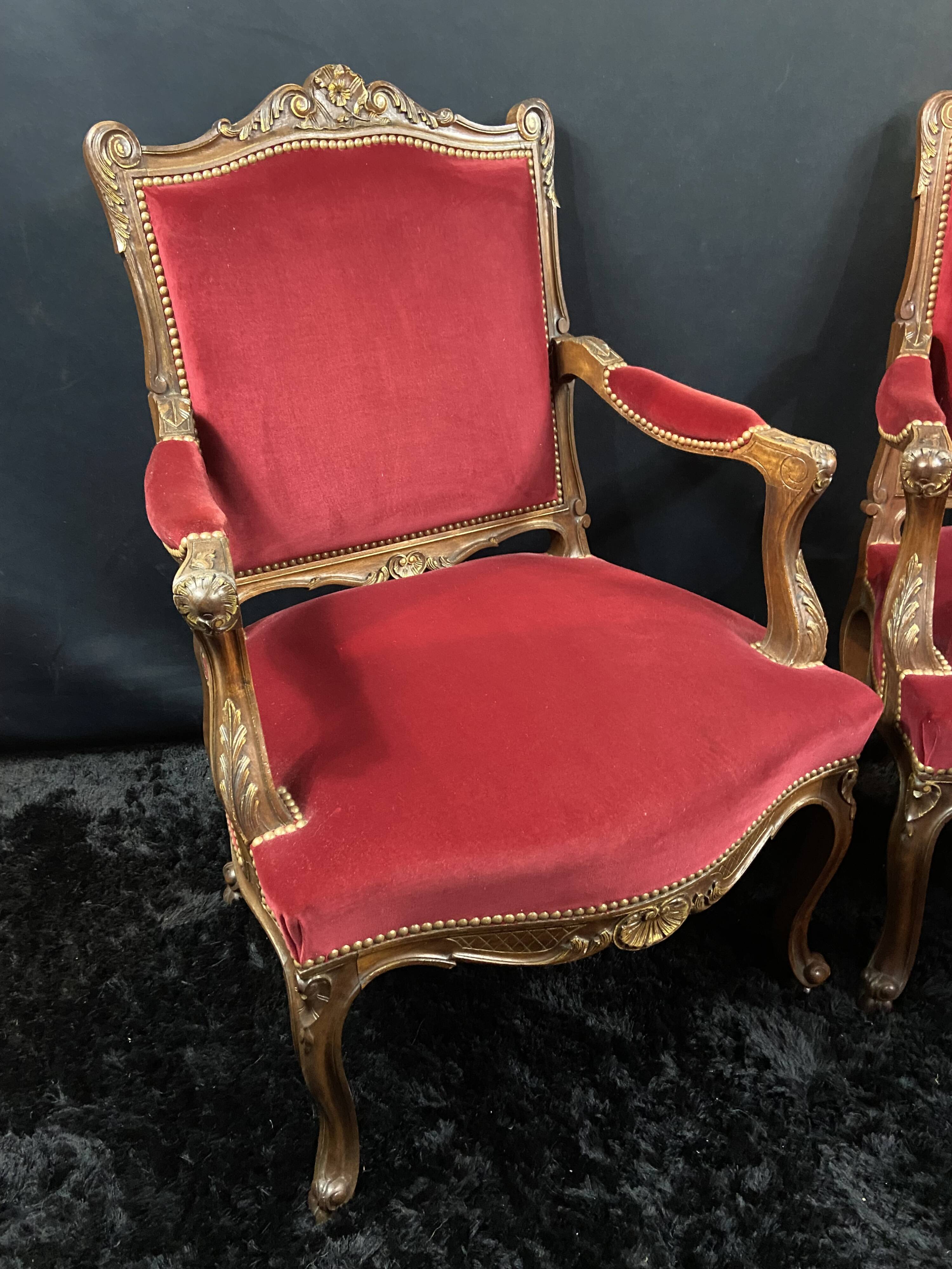 Pair of flat-back armchairs in Louis XV style in red velvet.