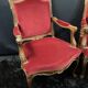 Pair of flat-back armchairs in Louis XV style in red velvet.
