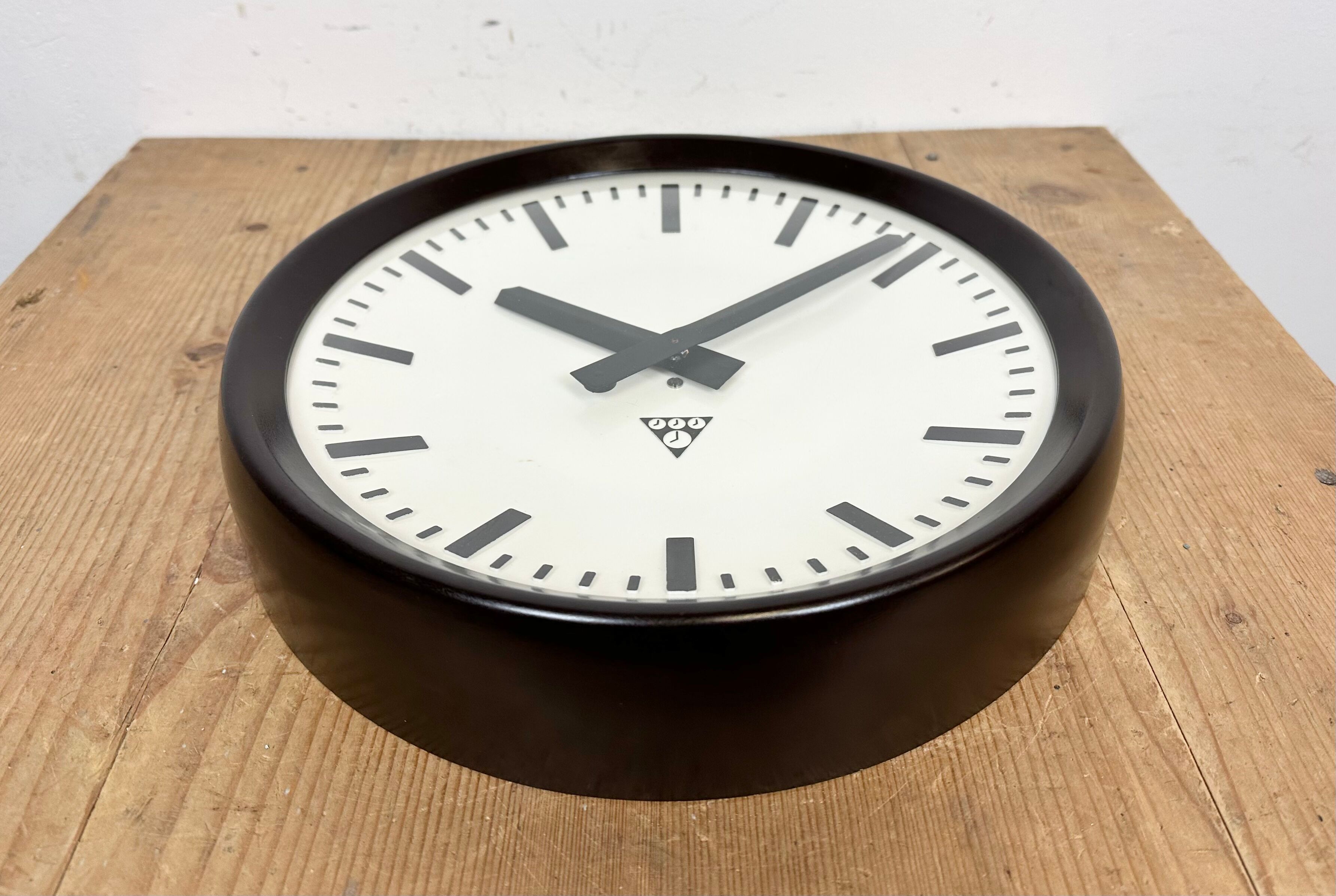 Industrial bakelite factory wall clock from Pragotron, 1960s