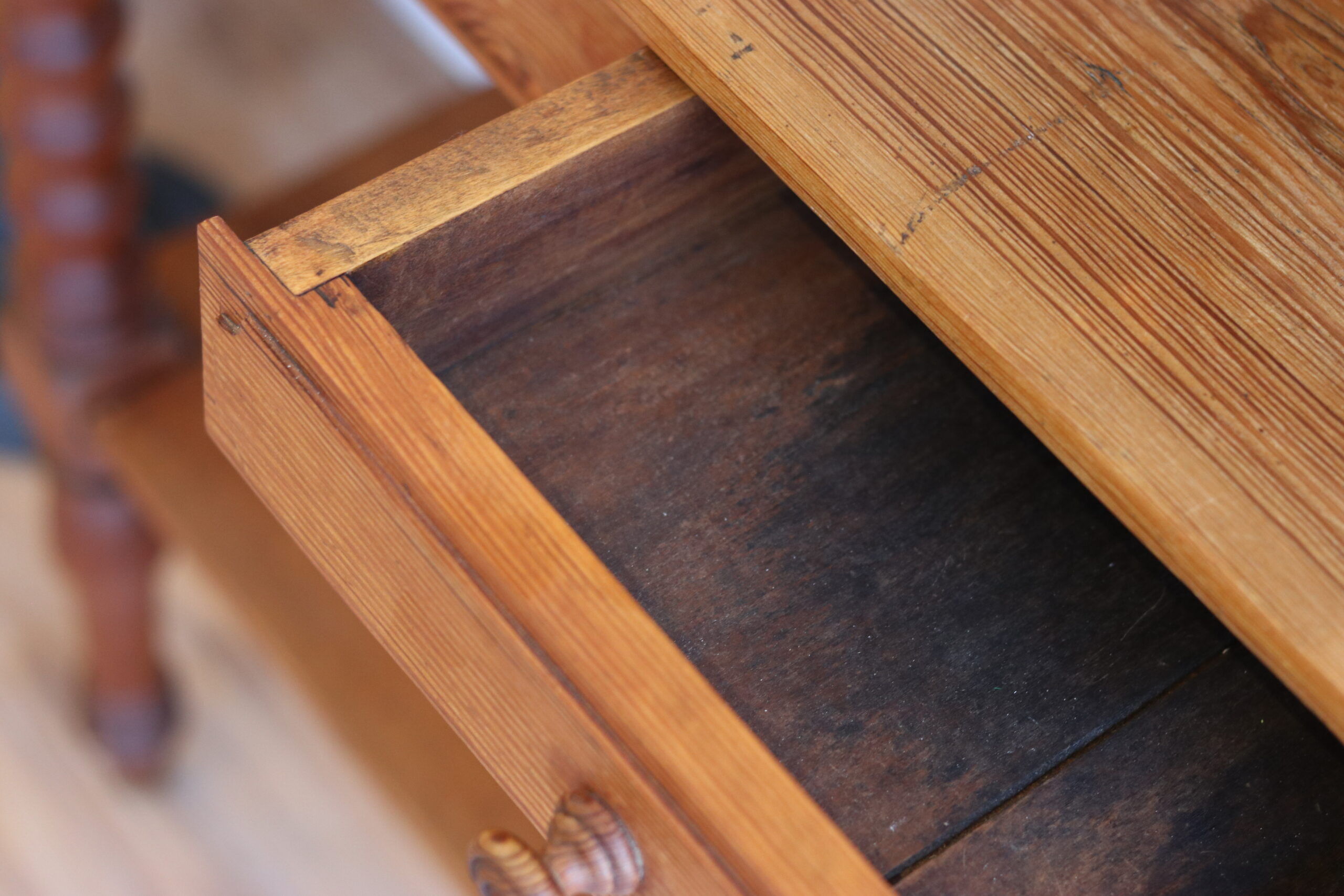 Large console or shop sideboard in pitch pine, early 20th century.