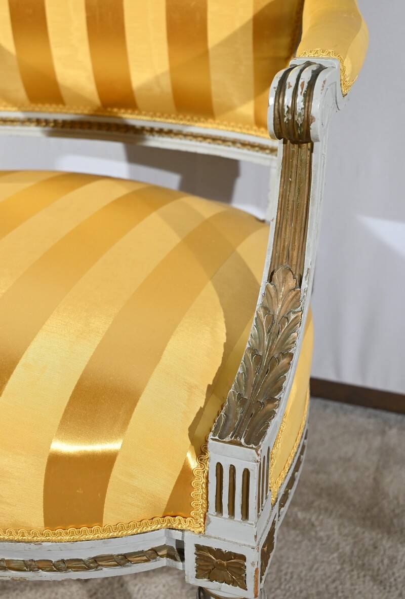 Pair of Cabriolet Armchairs, in rechampi wood, Louis XVI style – Late 19th century