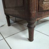 Bonnetière man standing cabinet a door