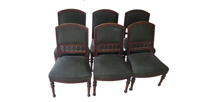 6 English style mahogany chairs covered with imitation green leather.
