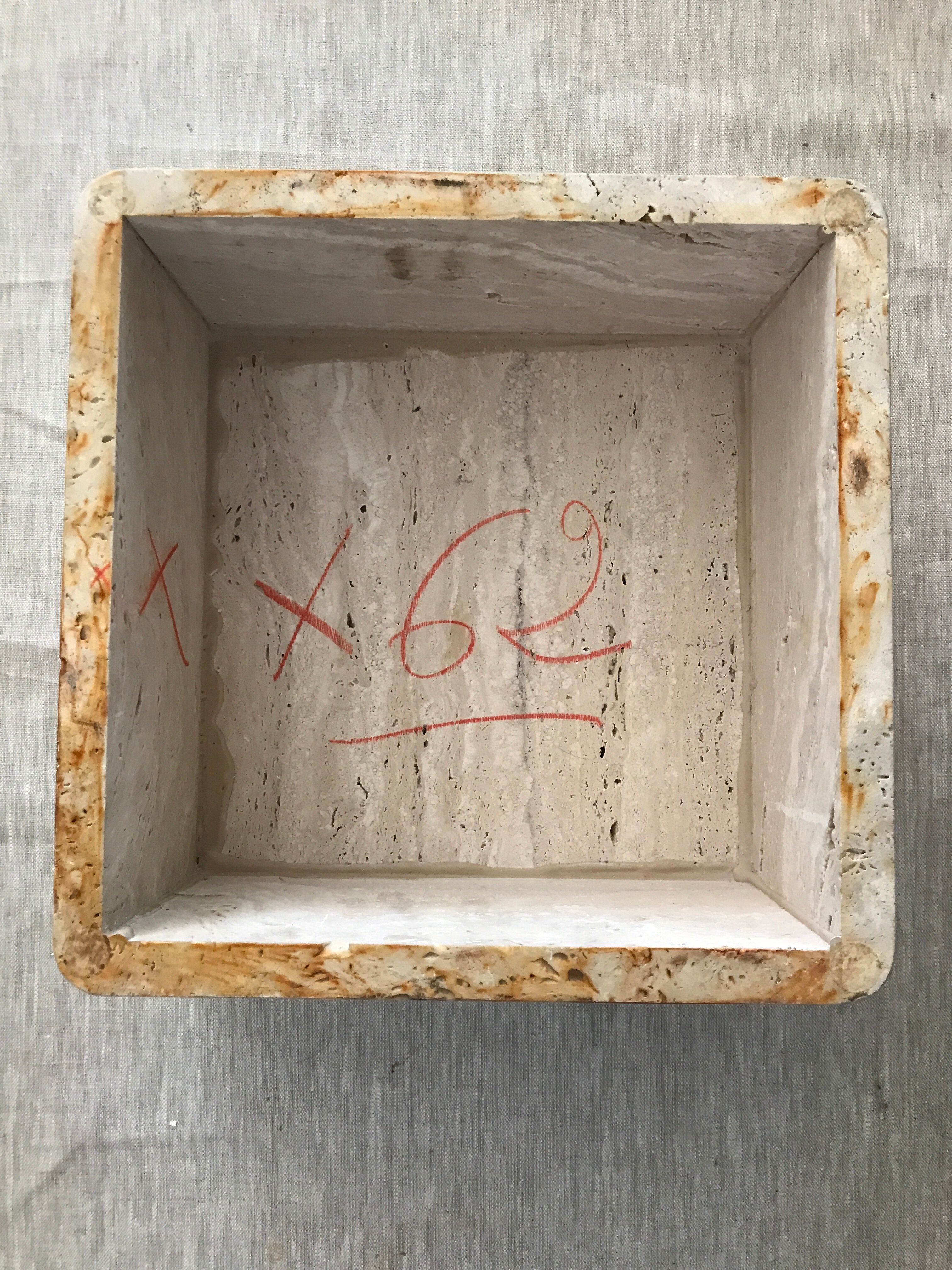 Sculptural travertine coffee table