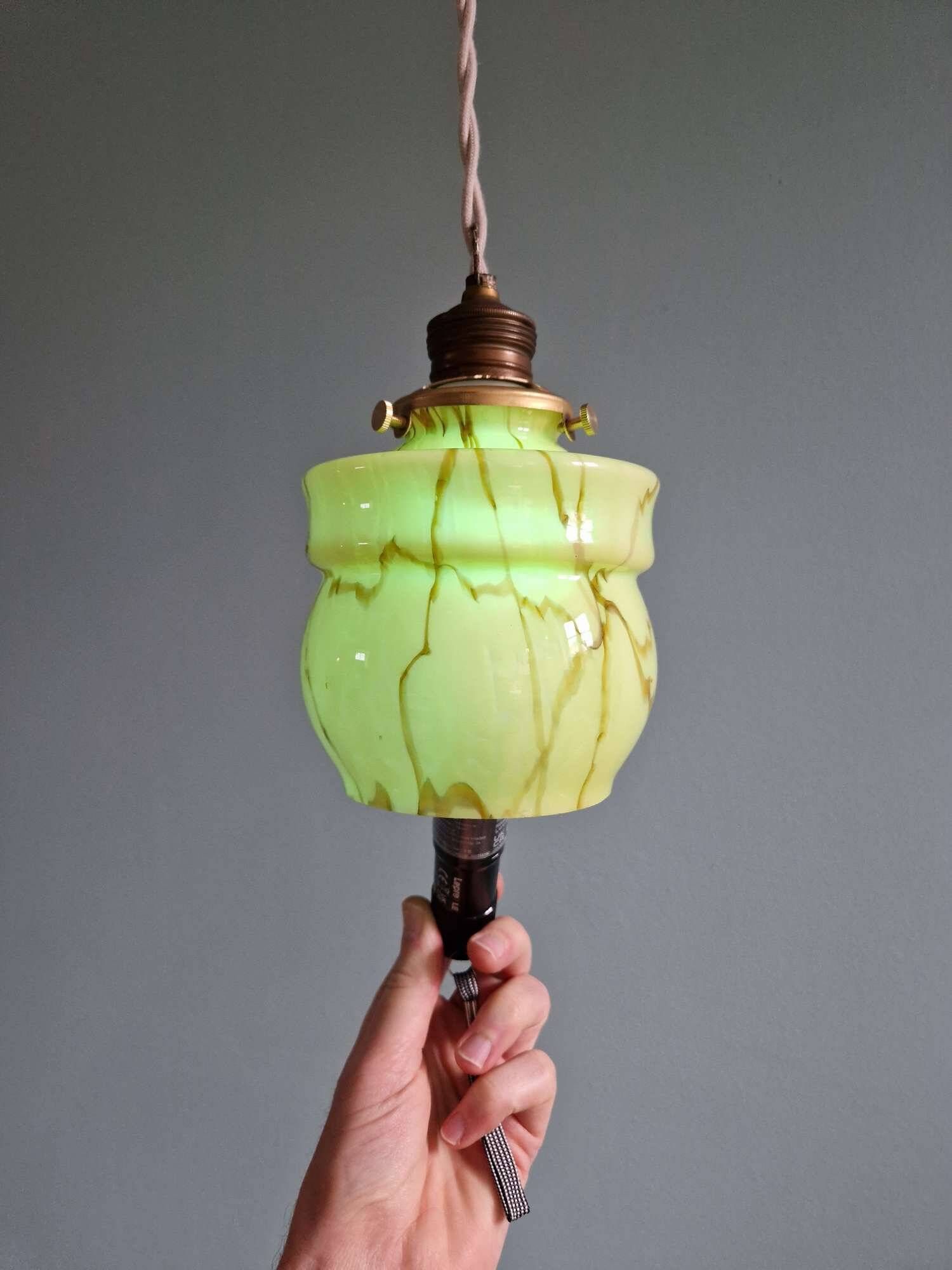Art Deco trio of suspensions in opaline and marbled ouraline, Scailmont, 1920-30.