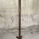 Vintage brutalist floor lamp made of turned wood.