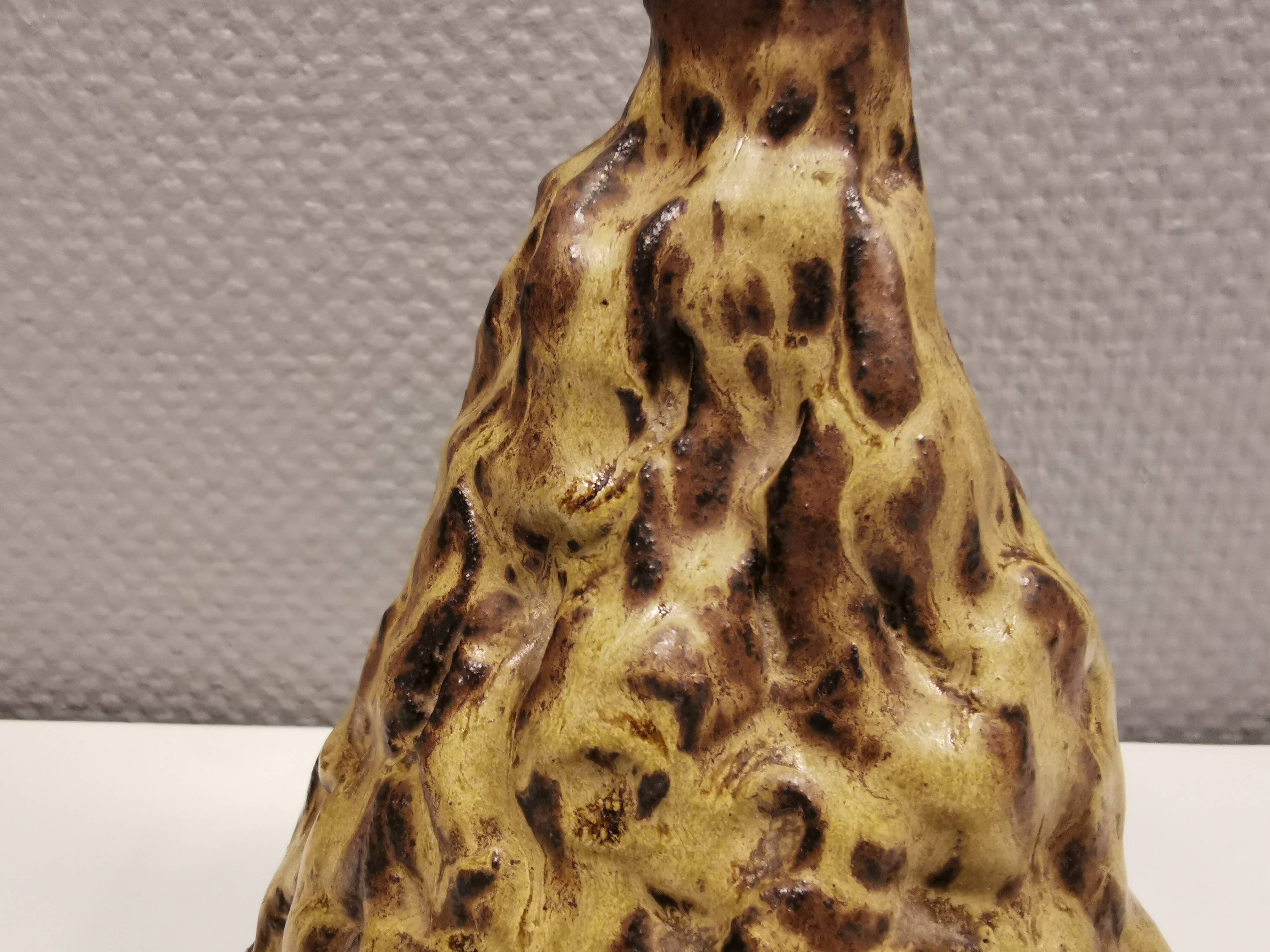 Ceramic table lamp, in greenish/brownish glaze, almost in the shape of a volcano.