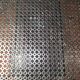 Perforated wrought iron rolling dessert trolley