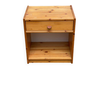 Scandinavian bedside table made of solid pine wood.