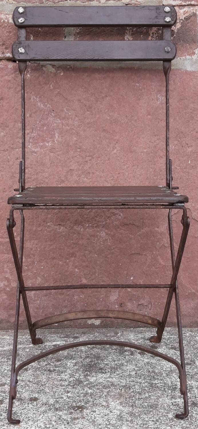Foldable wrought iron chair