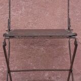 Foldable wrought iron chair