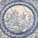 Antique glazed ceramic wall plate with battle scene decoration 41.5 cm