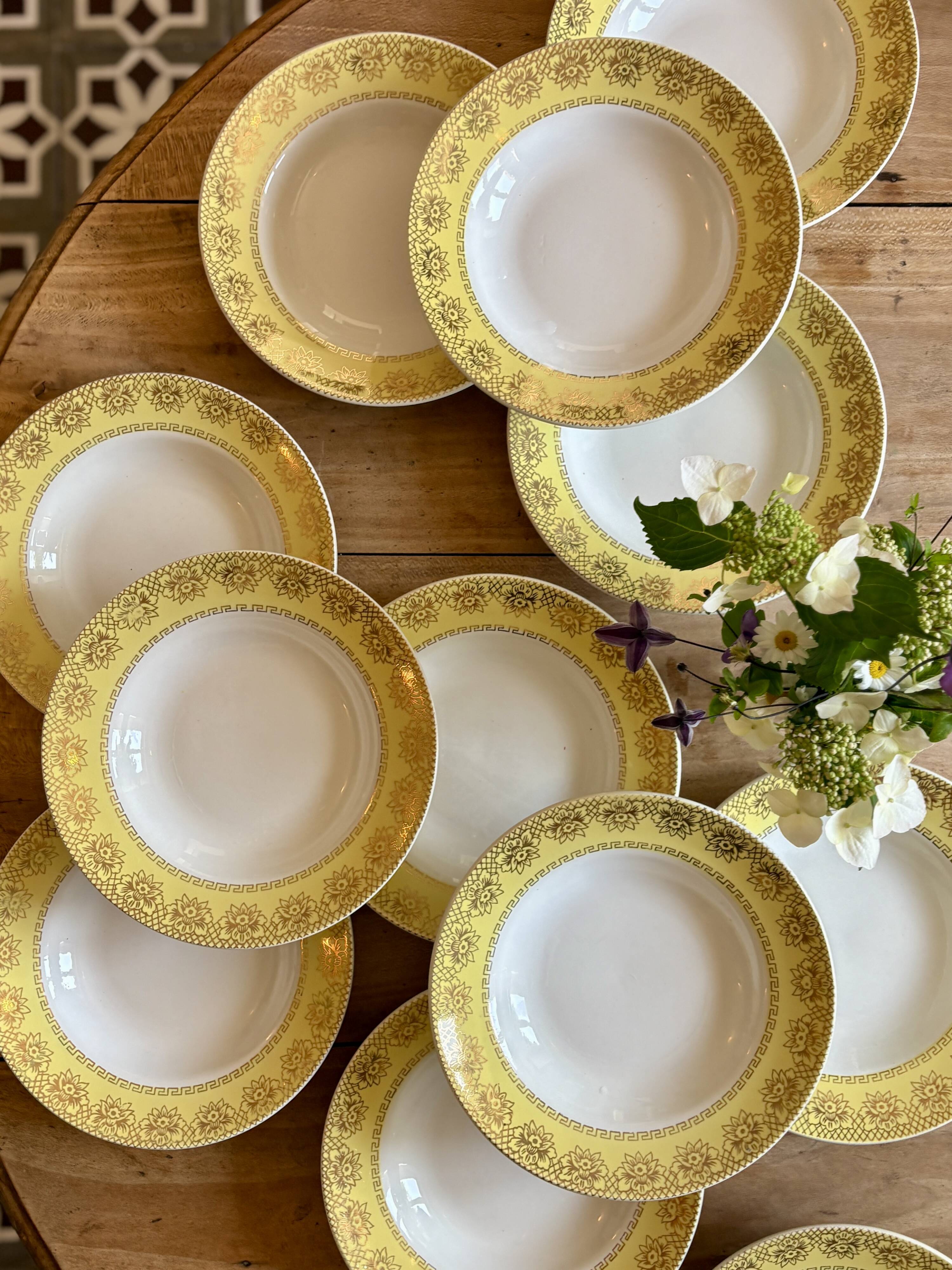 Set of 12 vintage yellow, white and gold soup plates