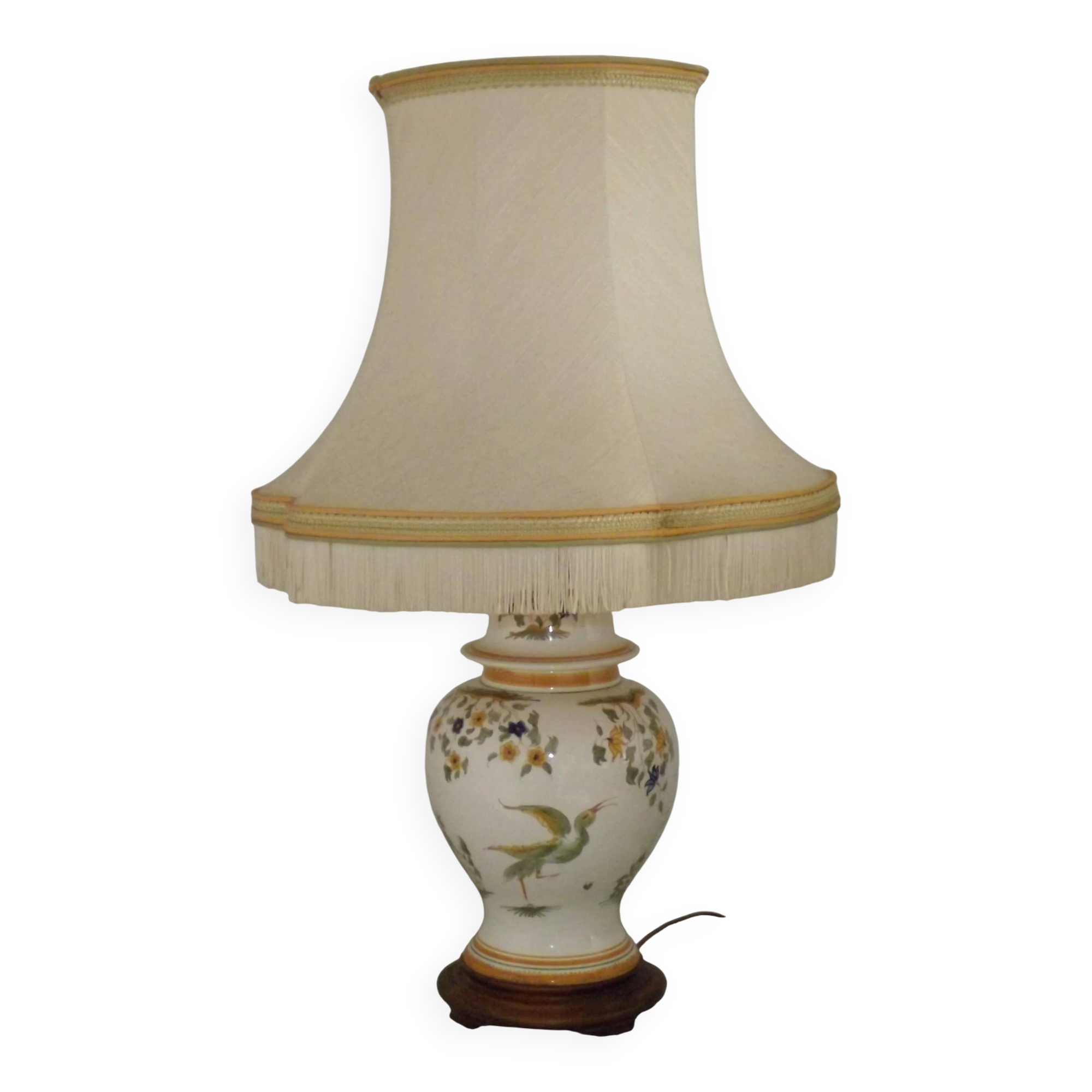 Table lamp with wooden base and fringed shade