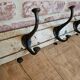 Solid teak coat hook with 4 double cast iron hooks