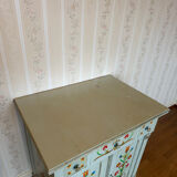 Antique low polychrome sideboard with floral decoration.
