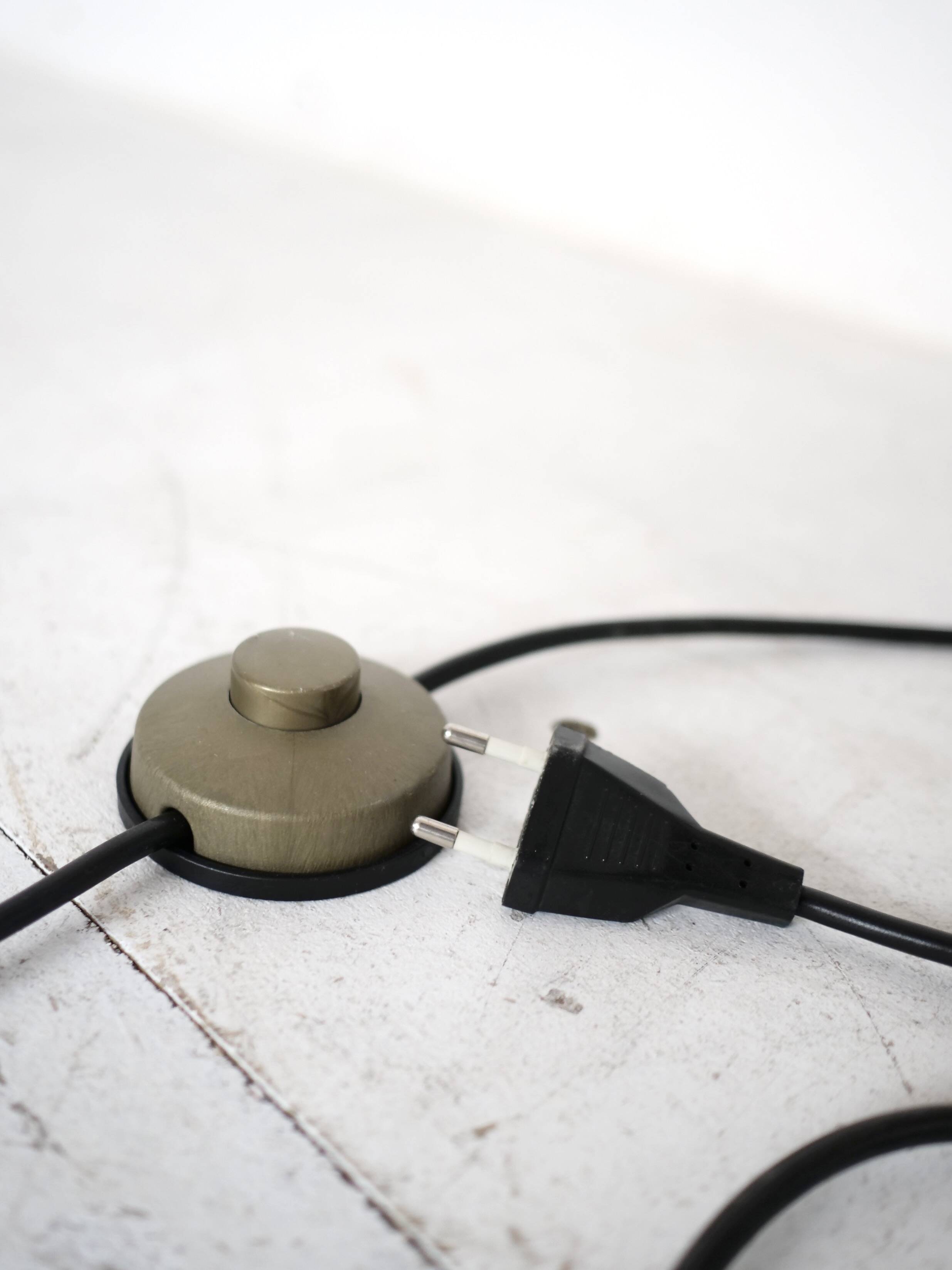 Large-format Uchiwa light fixture designed by Ingo Maurer