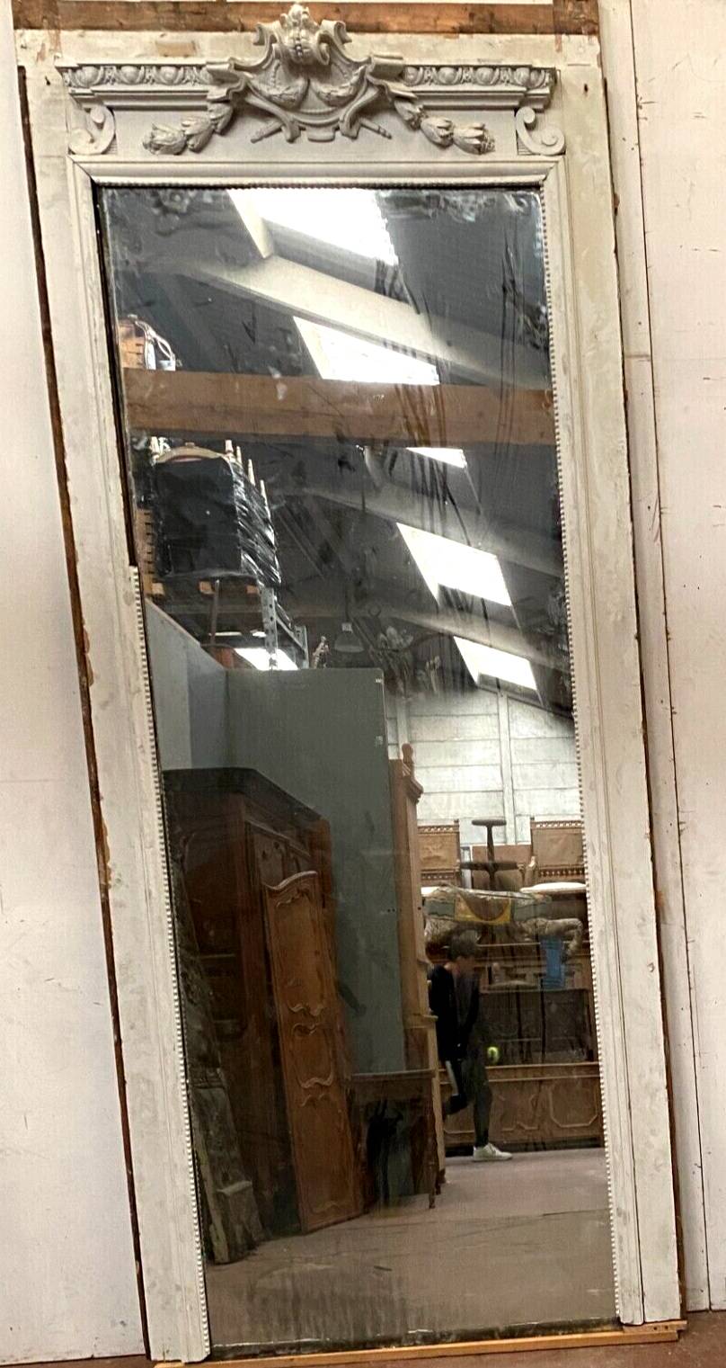 Napoleon III style mirror in carved wood and stucco 19th century