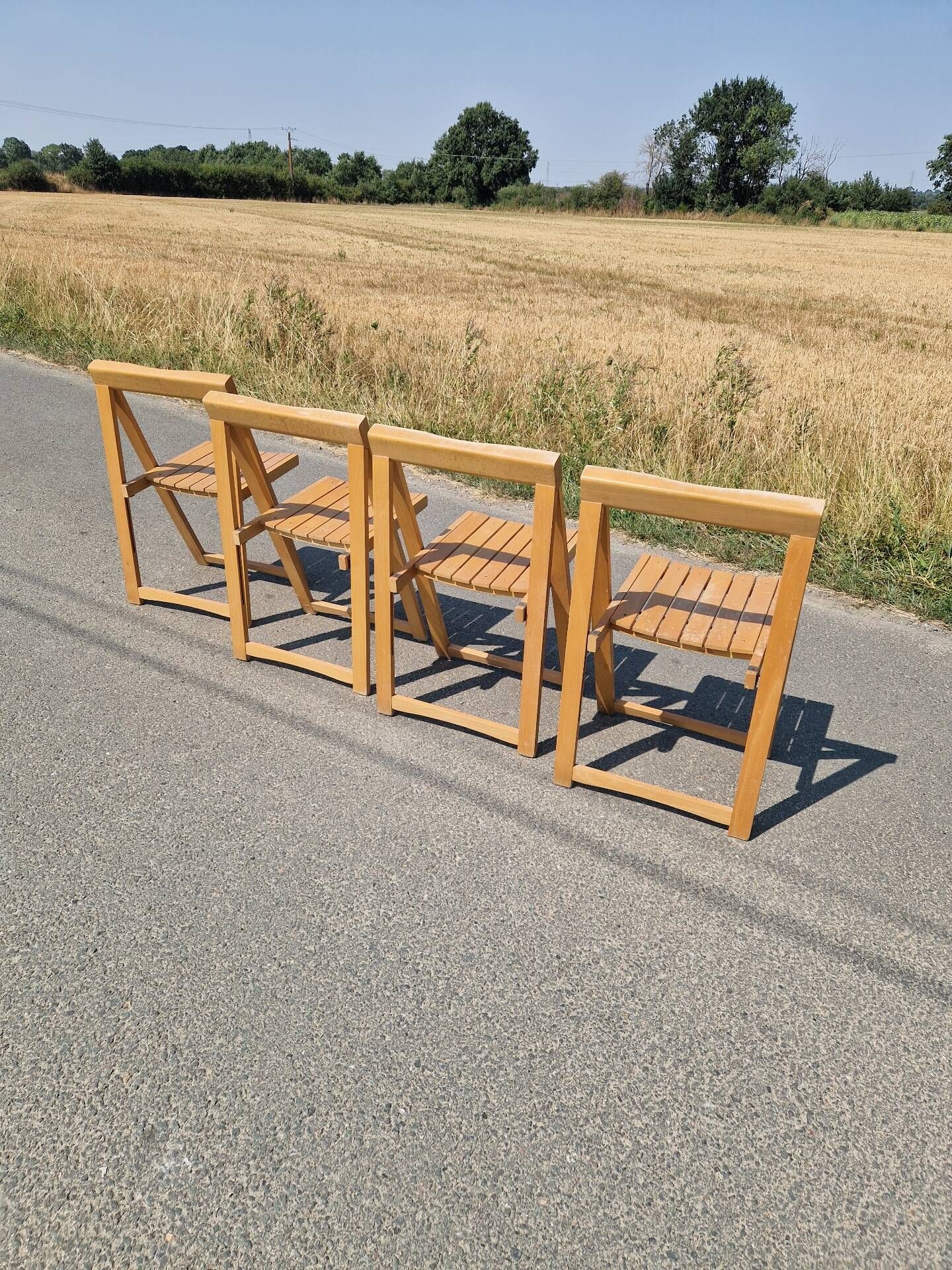Set of 4 folding chairs by Aldo Jacober