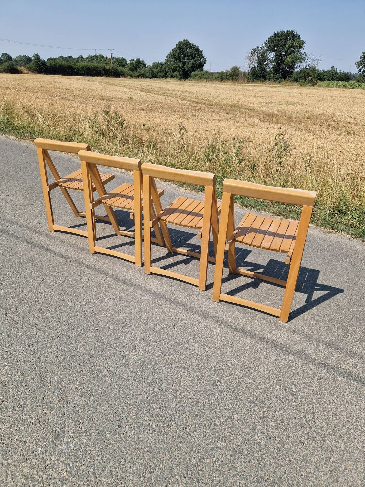 4 chaises pliantes par Aldo Jacober