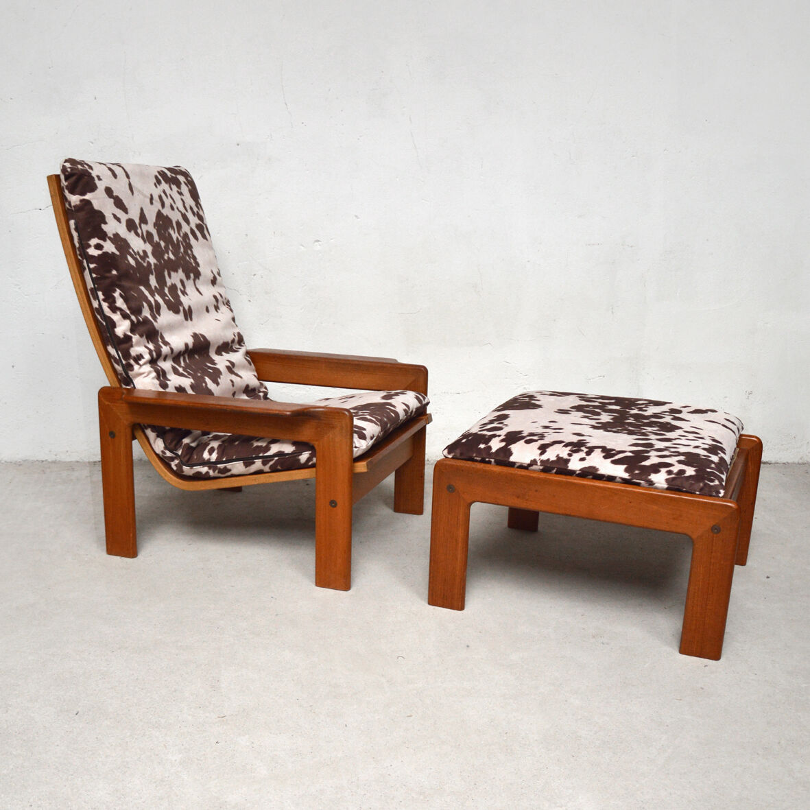 Pair of Danish teak armchairs and footrests, 1960