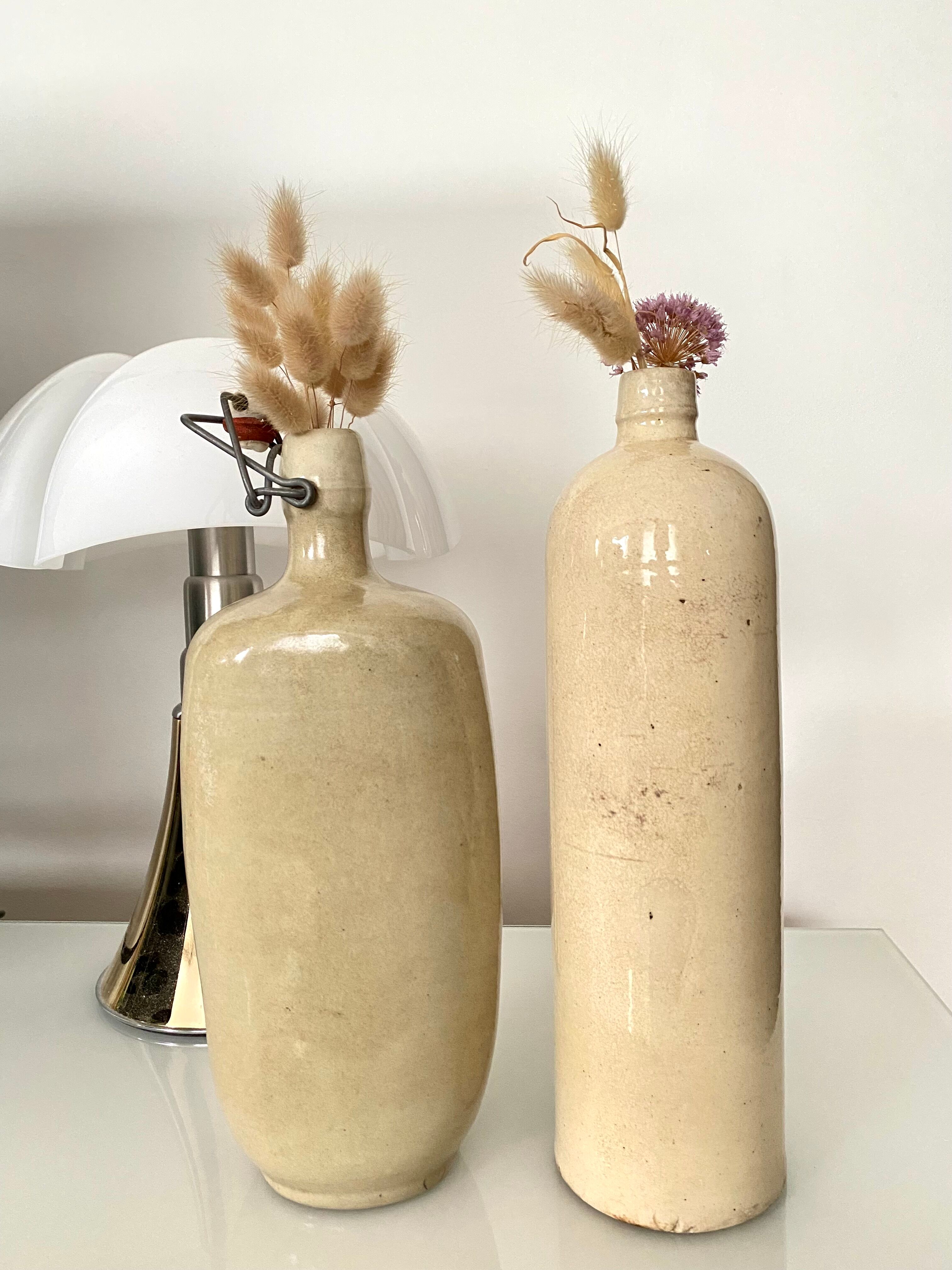 Set of 2 enamelled sandstone bottles