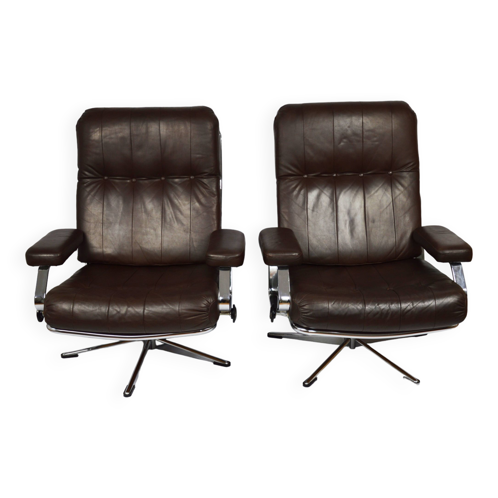 A pair of leather armchairs, 1970s