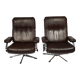A pair of leather armchairs, 1970s