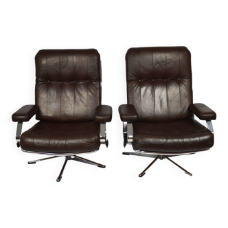 A pair of leather armchairs, 1970s