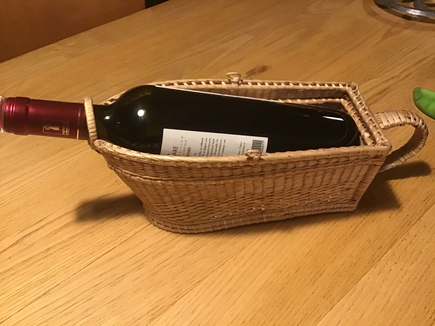 Old wicker bottle holder