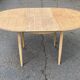 Table à manger scandinave ronde extensible rénovée en teck 1950