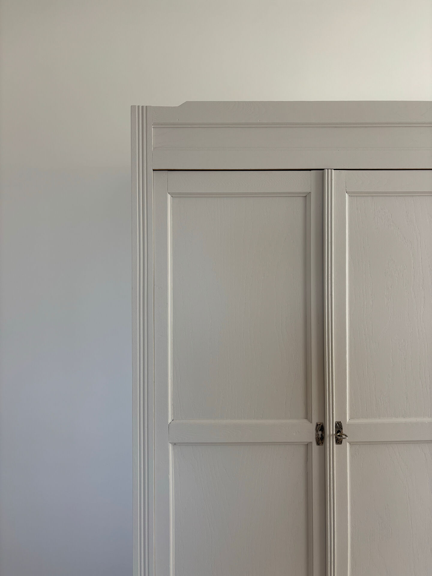 Large Parisian wardrobe in renovated oak wood.