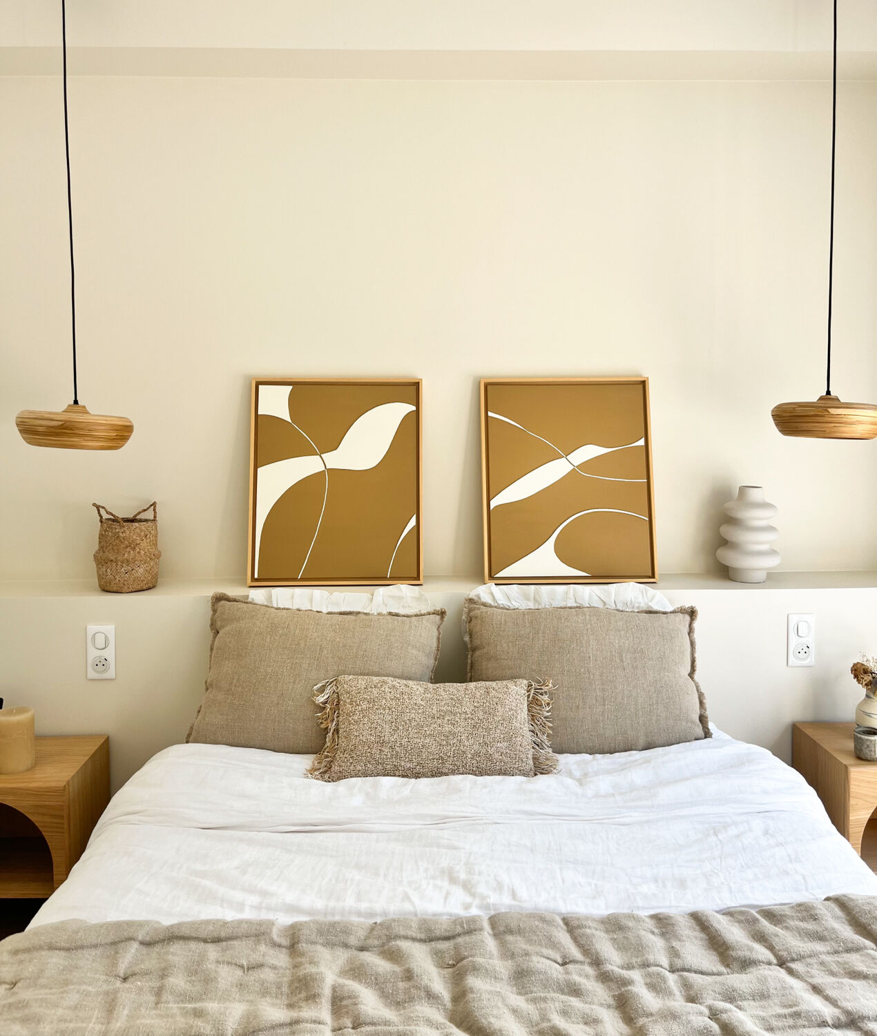 Diptych relief panels with a brown camel and cream background.