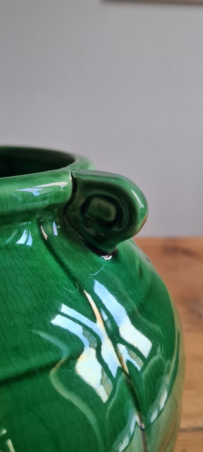Green glazed earthenware vase