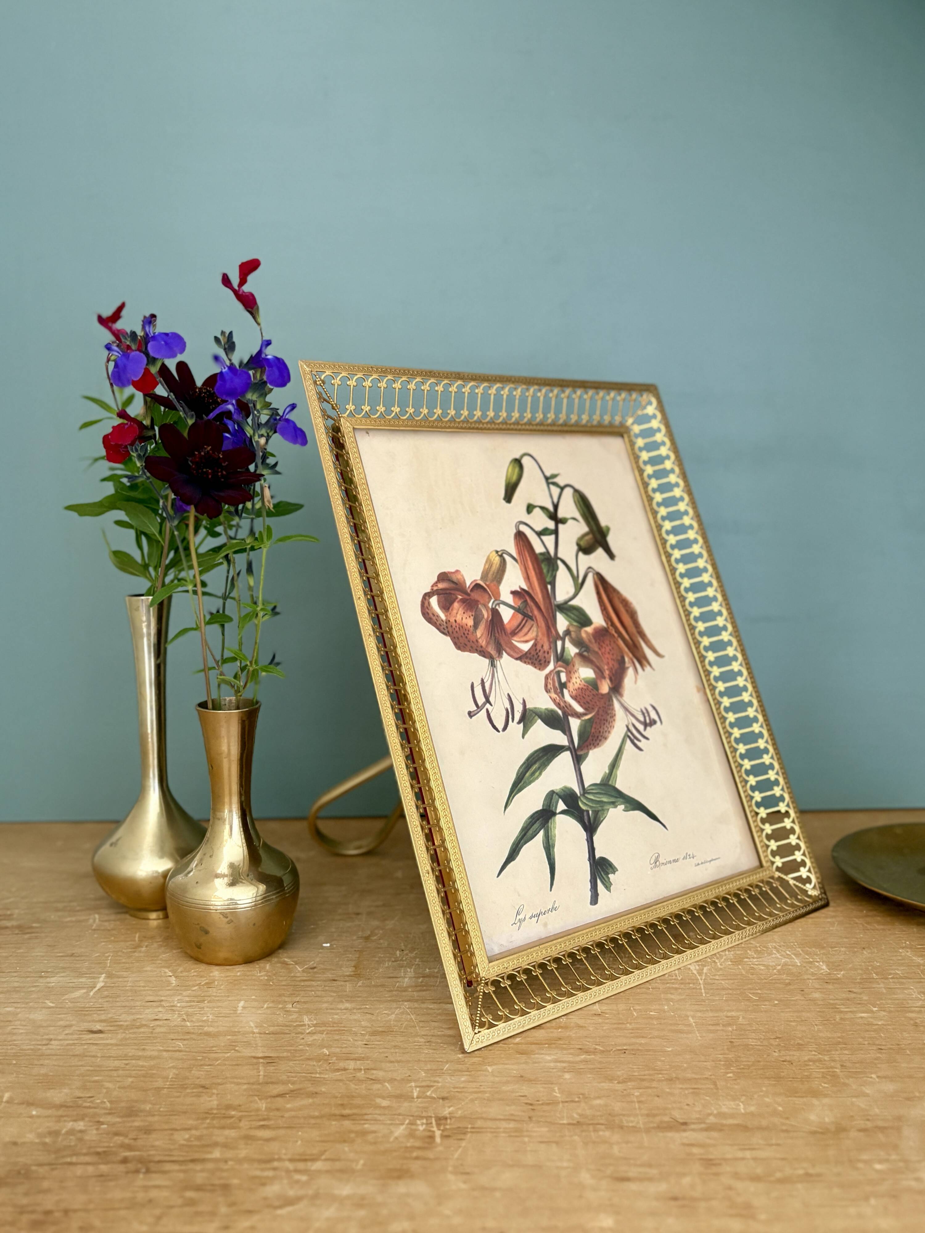 Antique gilt metal frame with flower engraving