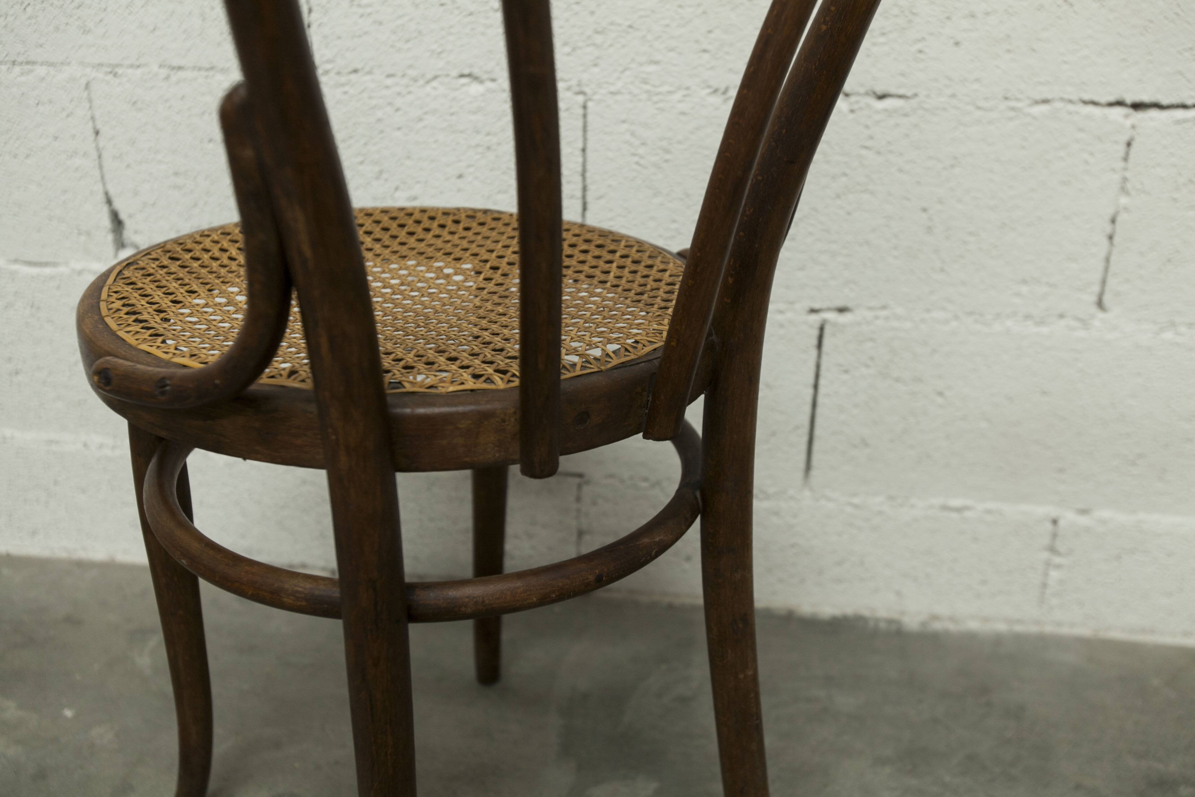 1920s curved wooden cane bistro chair