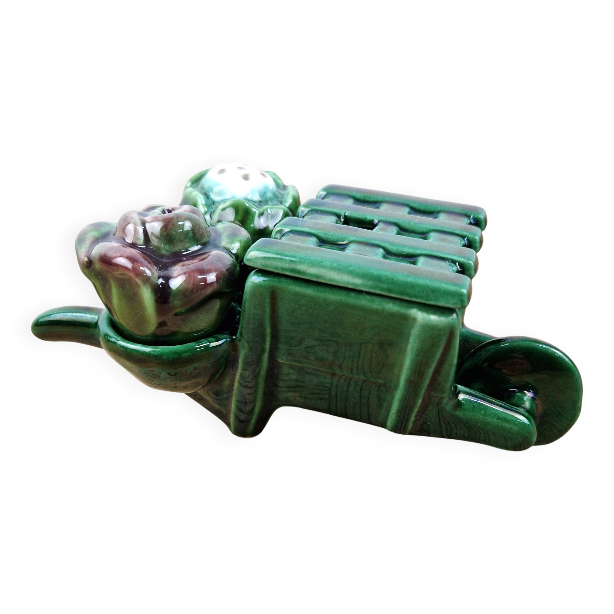 Art Deco mustard pots, salt cellars, and a wheelbarrow for cabbages.